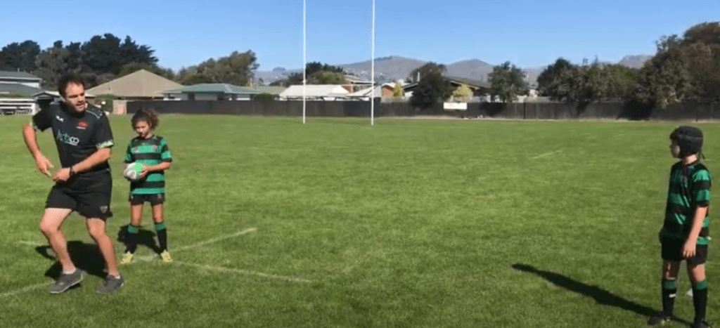 Rugby Pass Executed On The Run

